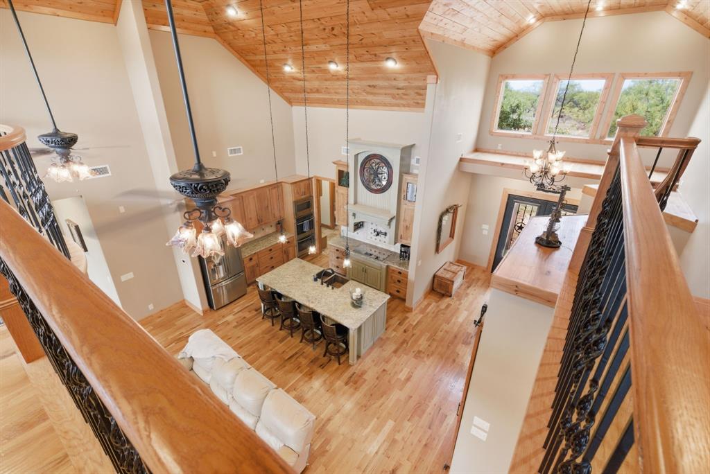 735 Gresham Lane Jacksboro, TX 76458 - Photo 20 of 40 a view of living room with furniture and a fireplace