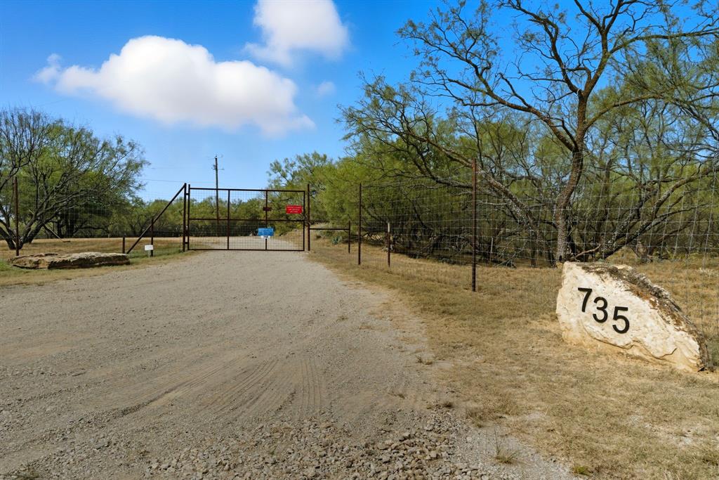 735 Gresham Lane Jacksboro, TX 76458 - Photo 2 of 40 a view of road and trees