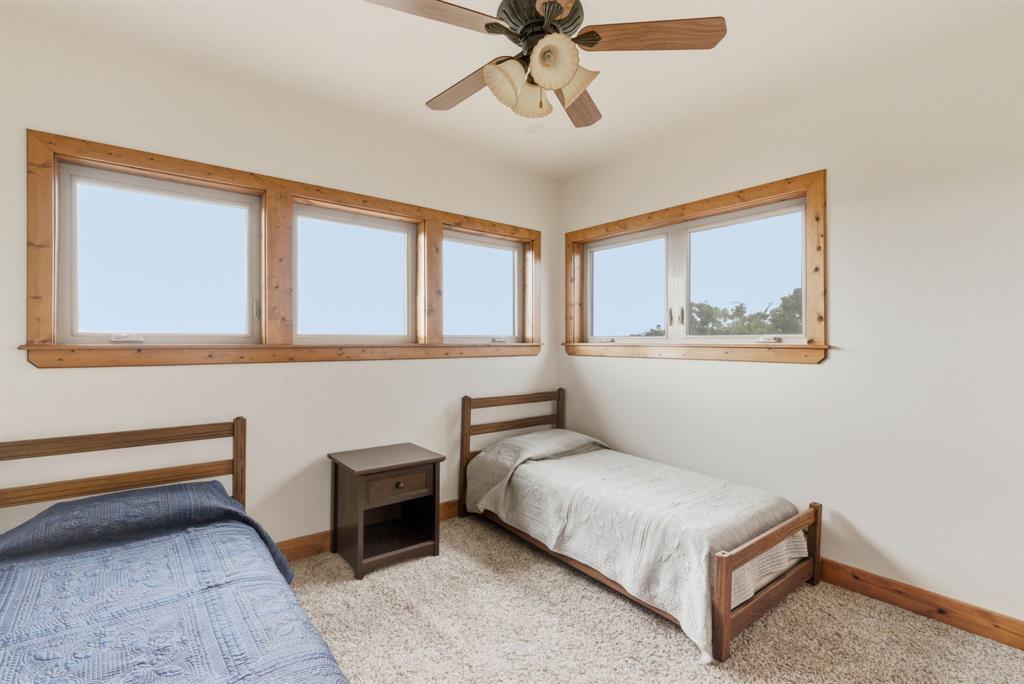 735 Gresham Lane Jacksboro, TX 76458 - Photo 23 of 40 a bedroom with a bed and window