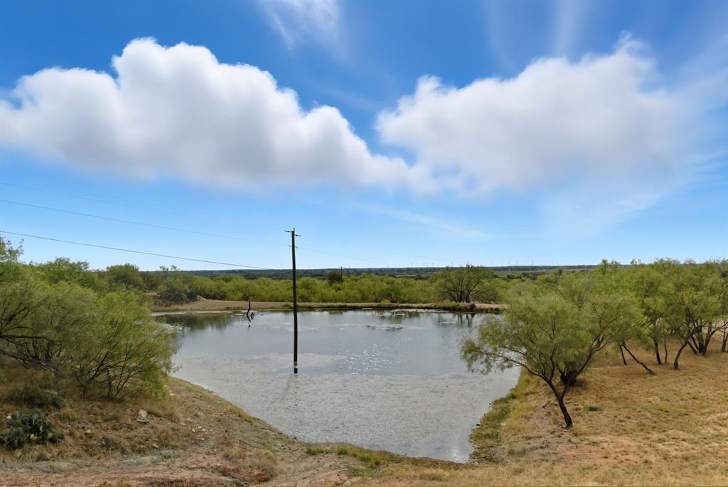 735 Gresham Lane Jacksboro, TX 76458 - Photo 27 of 40 a view of a lake in middle of the house