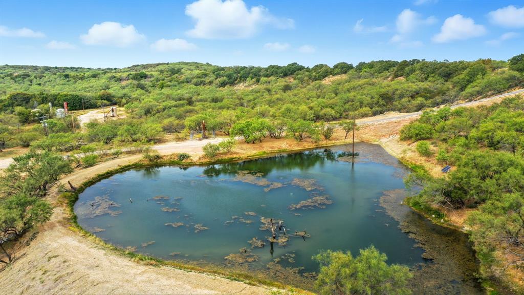 735 Gresham Lane Jacksboro, TX 76458 - Photo 36 of 40 an aerial view of a houses with outdoor space