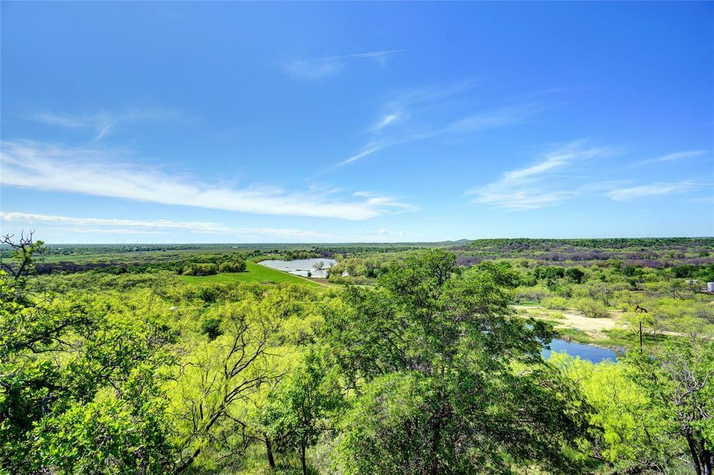 735 Gresham Lane Jacksboro, TX 76458 - Photo 40 of 40 a view of a big yard with large trees