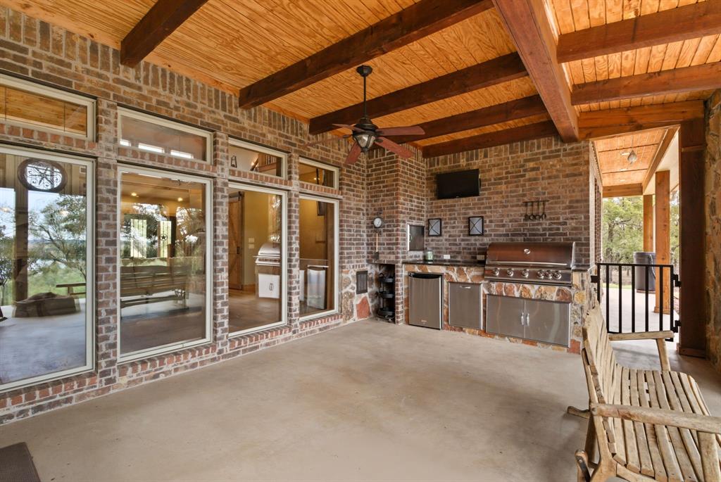 735 Gresham Lane Jacksboro, TX 76458 - Photo 7 of 40 a large building with glass door