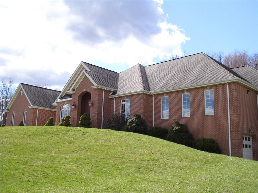 131 Malone Road Derry, PA 15627 - Photo 1 of 22 UNIQUE PROPERTY IN DERRY TOWNSHIP---GORGEOUS BRICK RANCH ON OVER 11 ACRES WITH 80 FLOWERING TREES ON THE PROPERTY WITH VIEW OF THE MOUNTAINS!