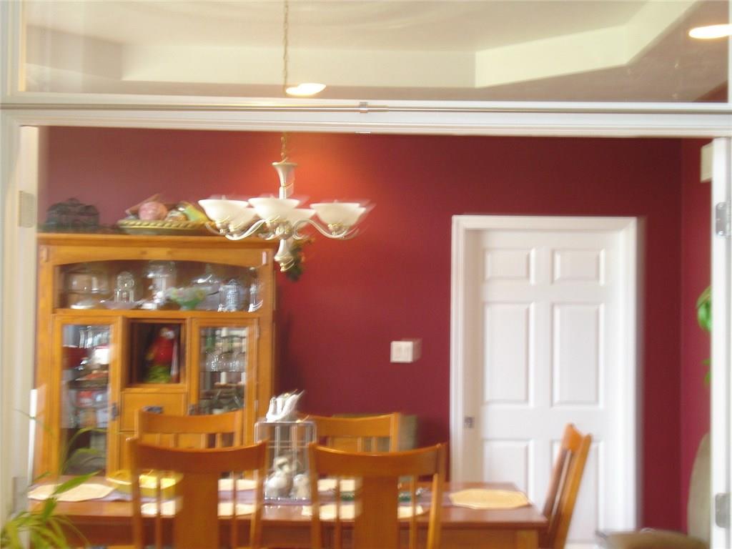131 Malone Road Derry, PA 15627 - Photo 6 of 22 FORMAL DINING ROOM WITH TRAY CEILING AND HARD WOOD FLOORS
