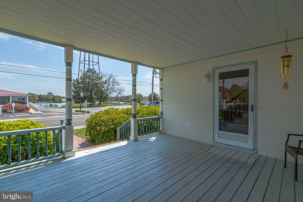 742 Main Street Reedville, VA 22539 - Photo 4 of 66 Charming porch with serene views.