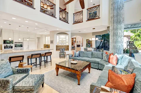 a view of a living room and kitchen