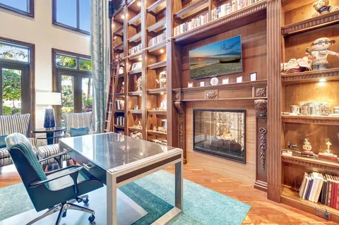 a spacious bathroom with a granite countertop tub sink and mirror