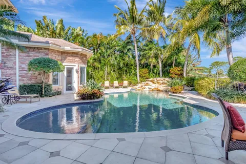 a aerial view of a house with a garden and plants