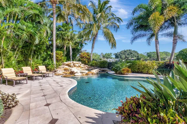 an aerial view of a house with outdoor space