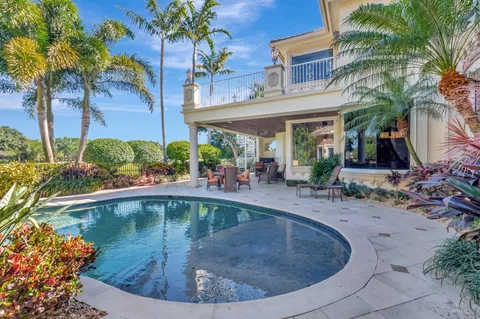 an aerial view of a house with a garden