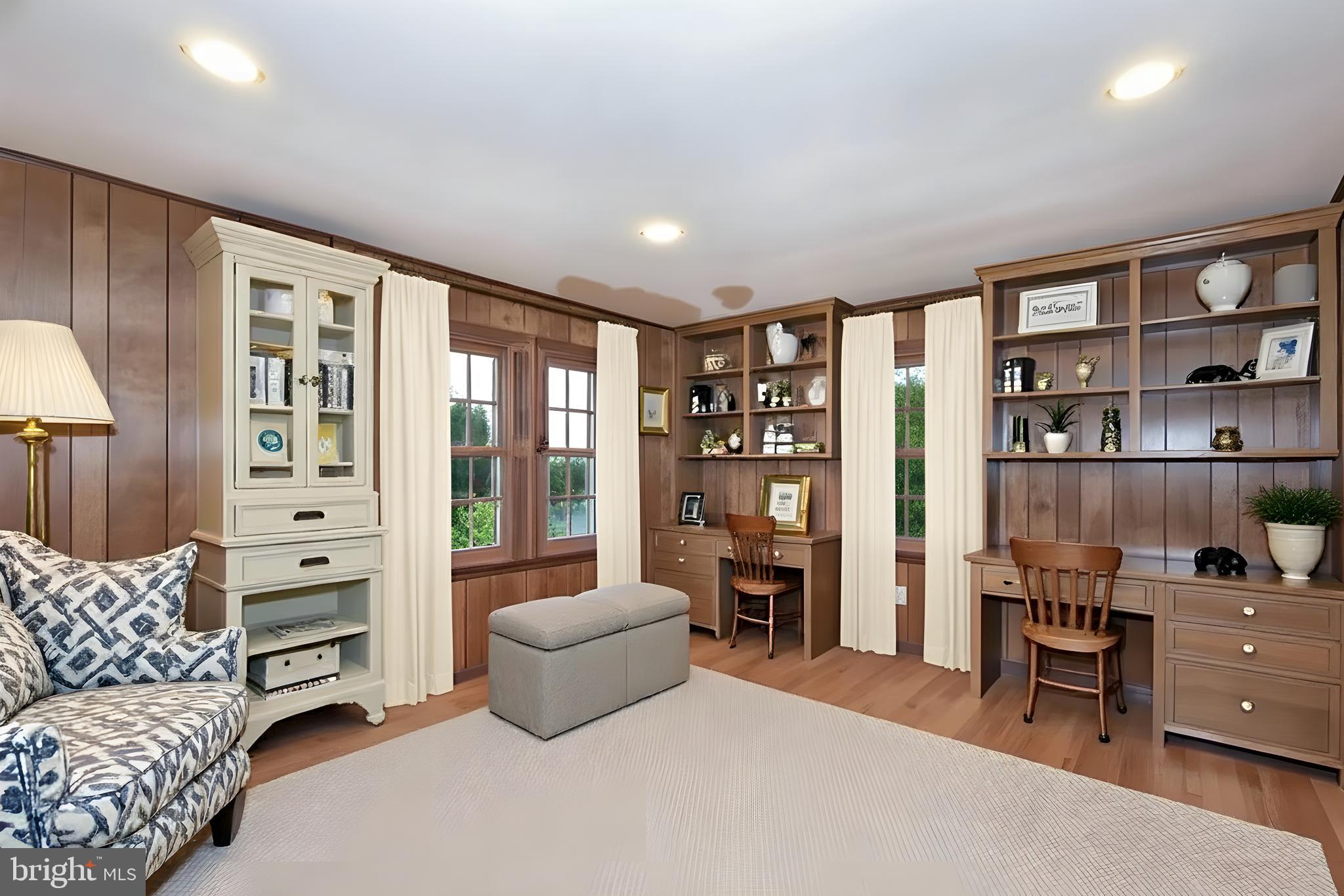 61 Ridge Road Westminster, MD 21157 - Photo 12 of 45 a living room with furniture and a bookshelf