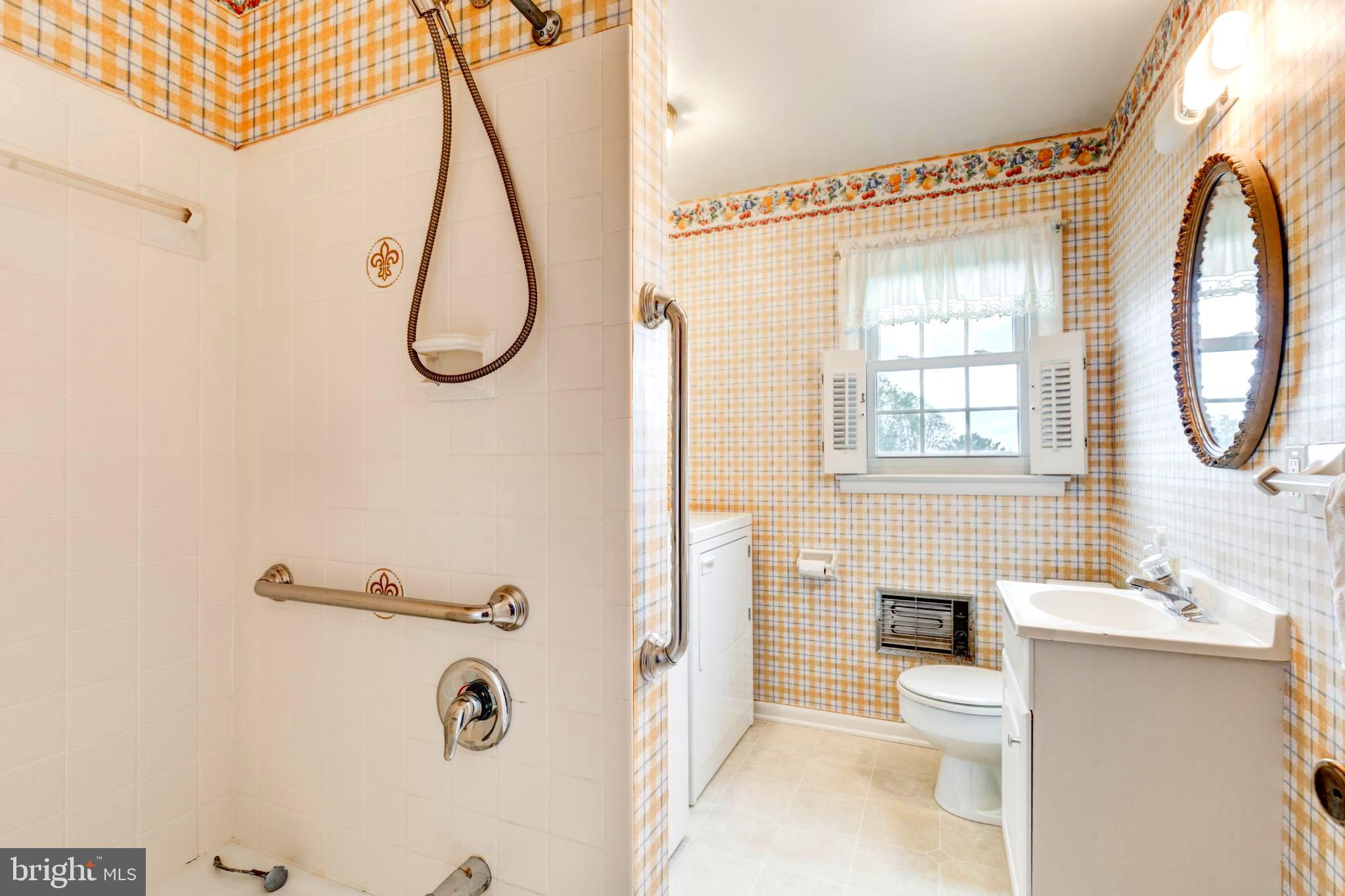 61 Ridge Road Westminster, MD 21157 - Photo 14 of 45 a bathroom with a granite countertop sink a toilet and a mirror