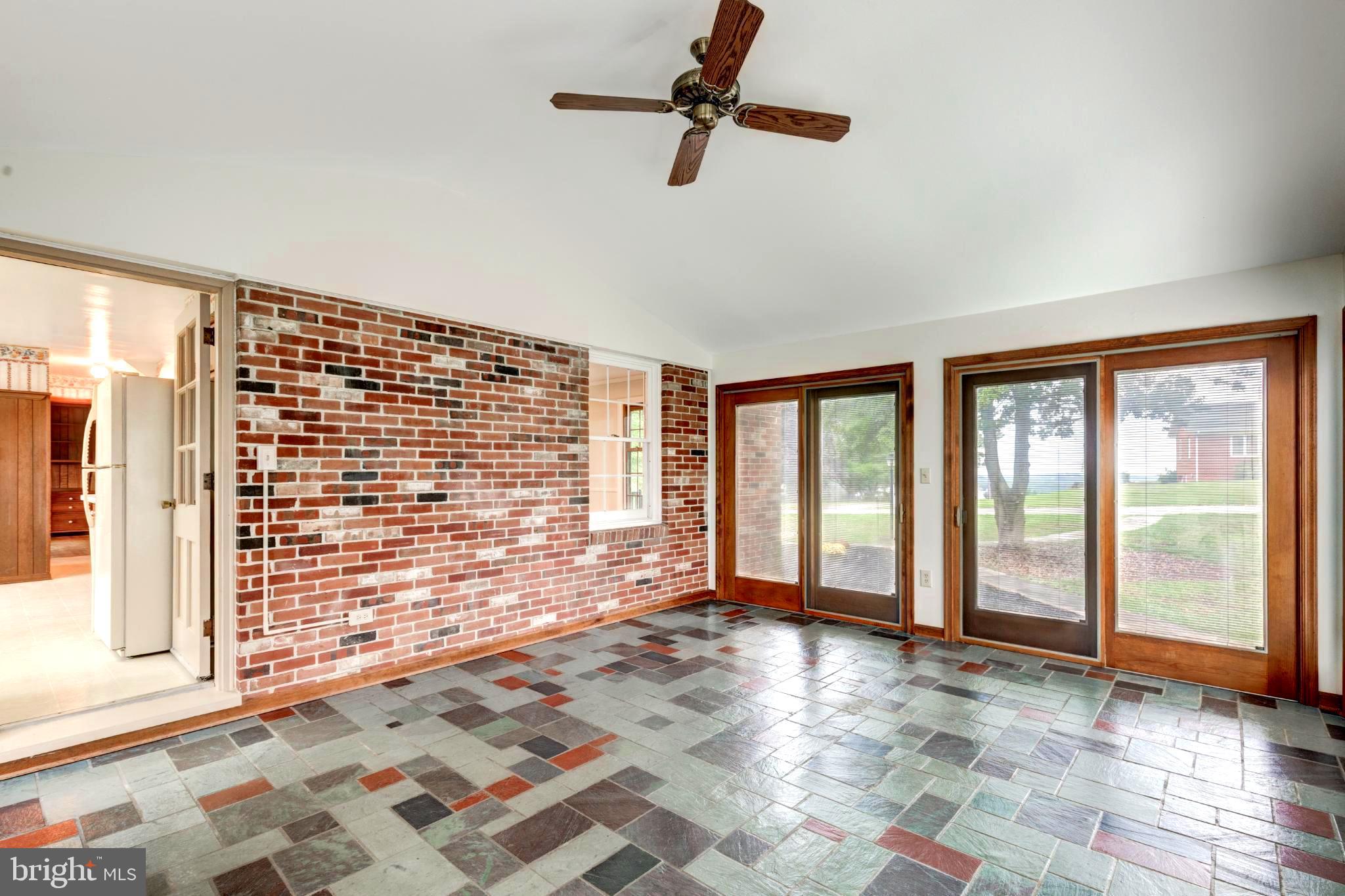 61 Ridge Road Westminster, MD 21157 - Photo 19 of 45 a view of an empty room with a window