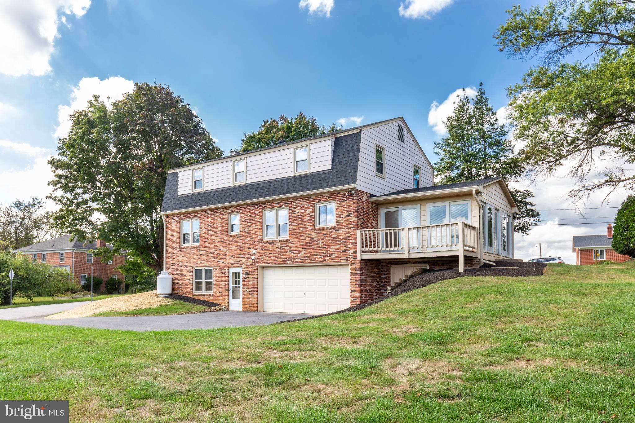 61 Ridge Road Westminster, MD 21157 - Photo 2 of 45 a view of a house with a yard porch and sitting area