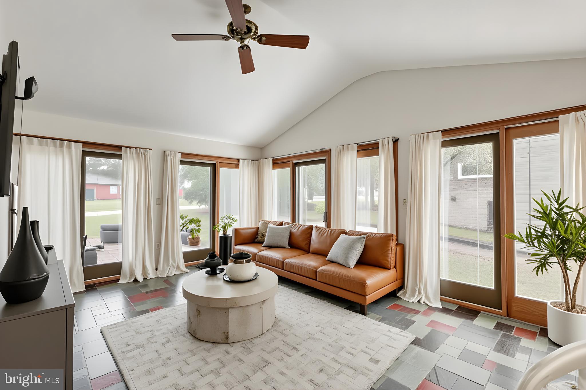61 Ridge Road Westminster, MD 21157 - Photo 21 of 45 a living room with furniture and a potted plant