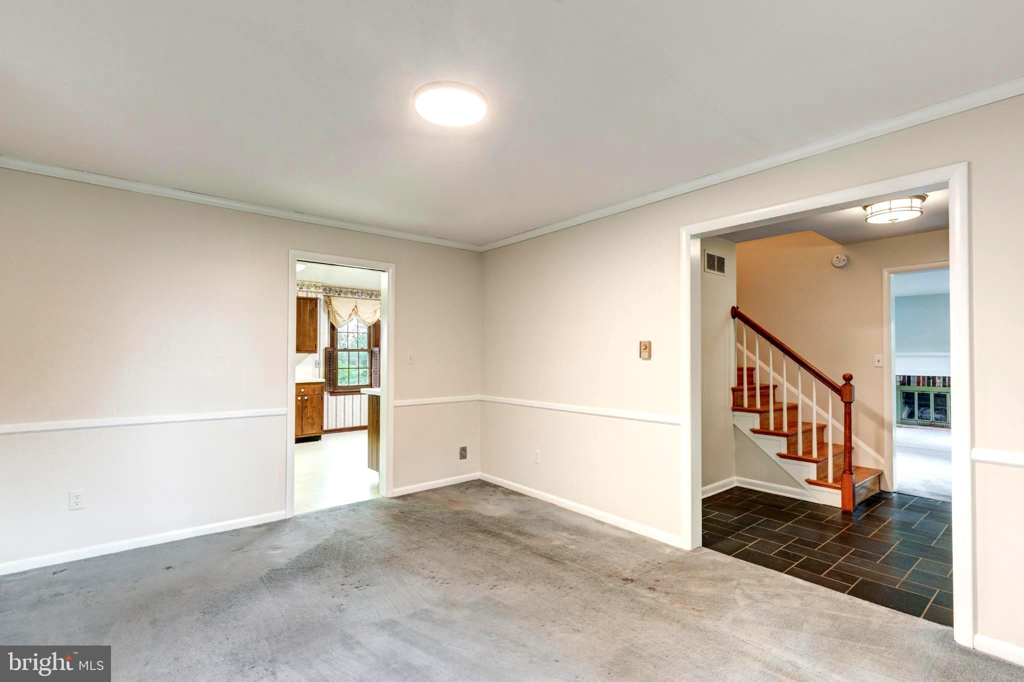 61 Ridge Road Westminster, MD 21157 - Photo 23 of 45 a view of a hallway with wooden floor and entryway