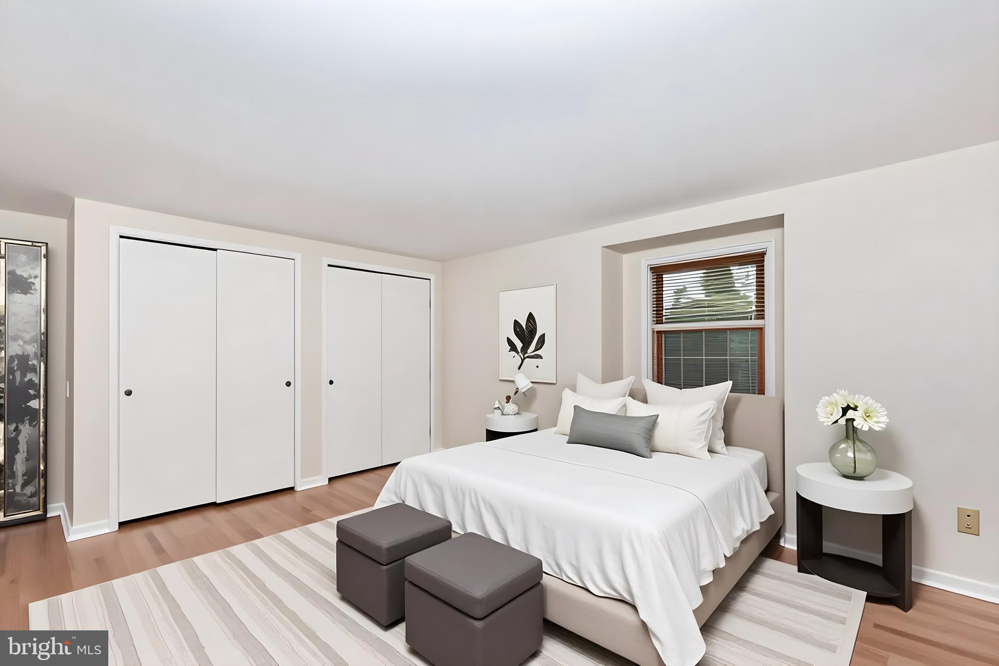 61 Ridge Road Westminster, MD 21157 - Photo 27 of 45 a bedroom with a bed and wooden floor