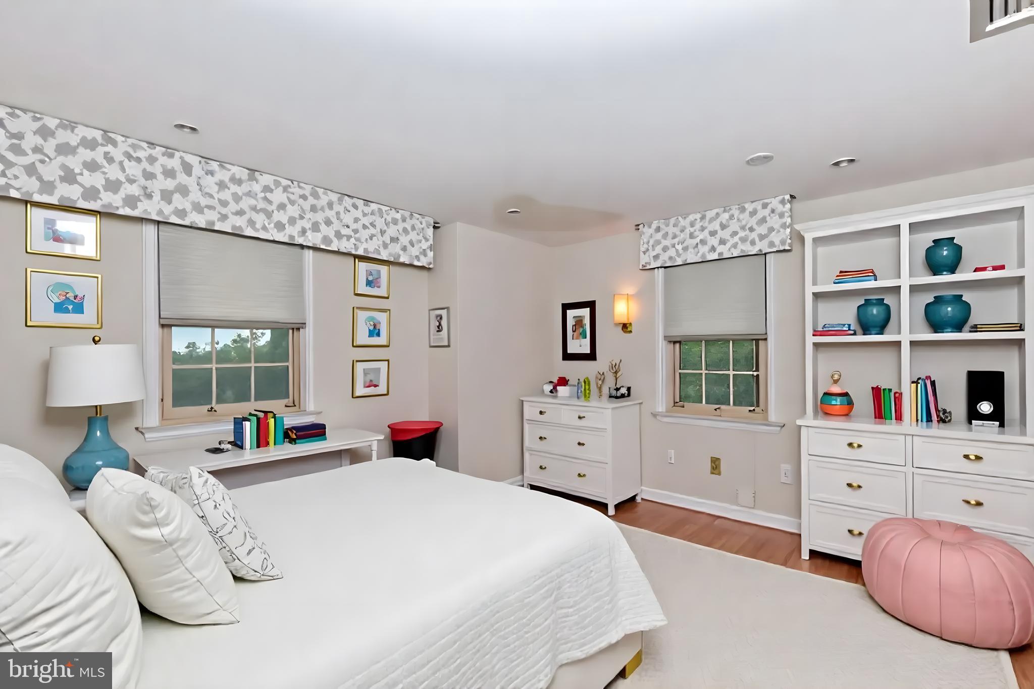 61 Ridge Road Westminster, MD 21157 - Photo 32 of 45 a bedroom with a bed a dresser and a large window