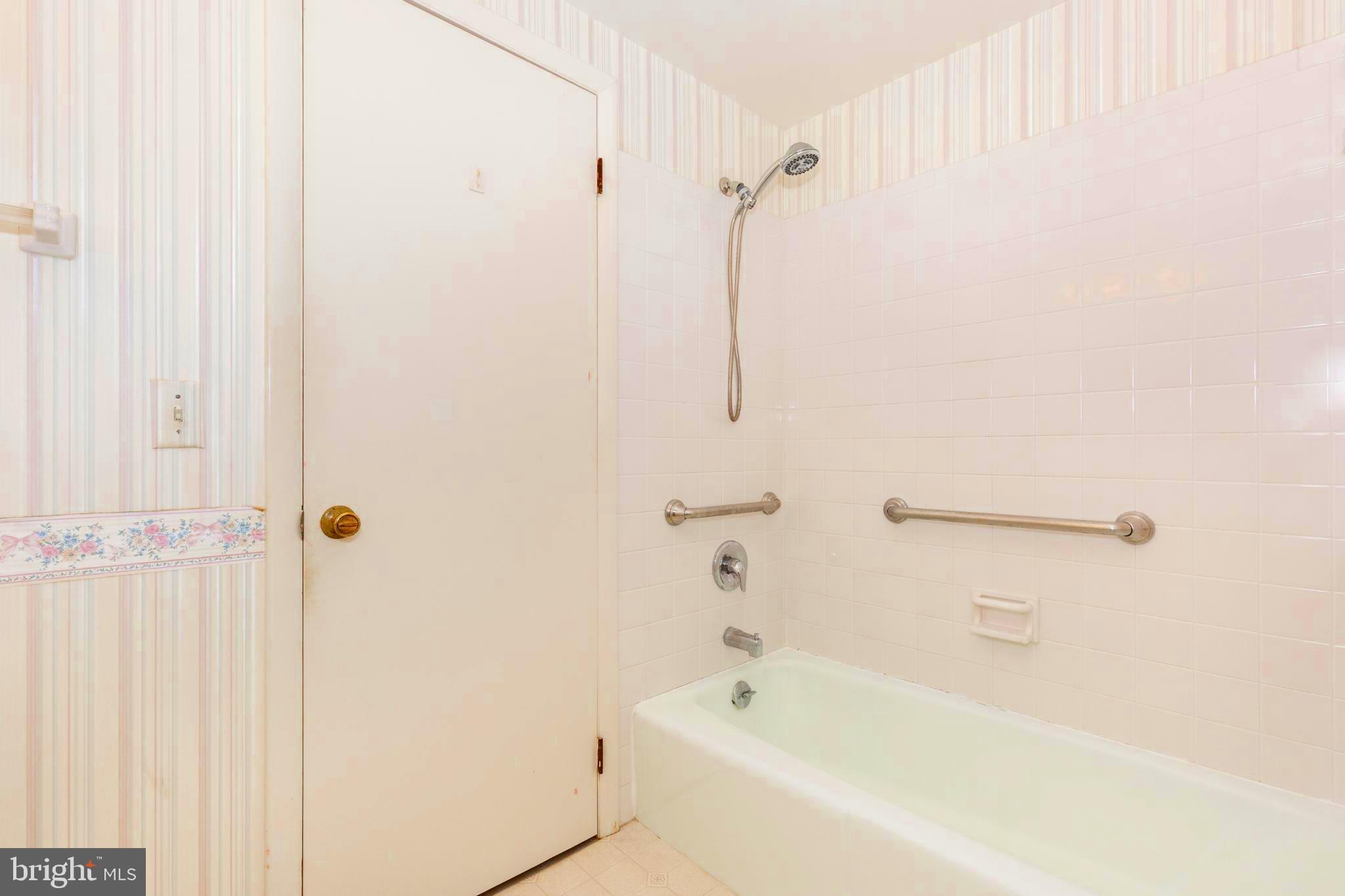 61 Ridge Road Westminster, MD 21157 - Photo 36 of 45 a bathroom with a bathtub