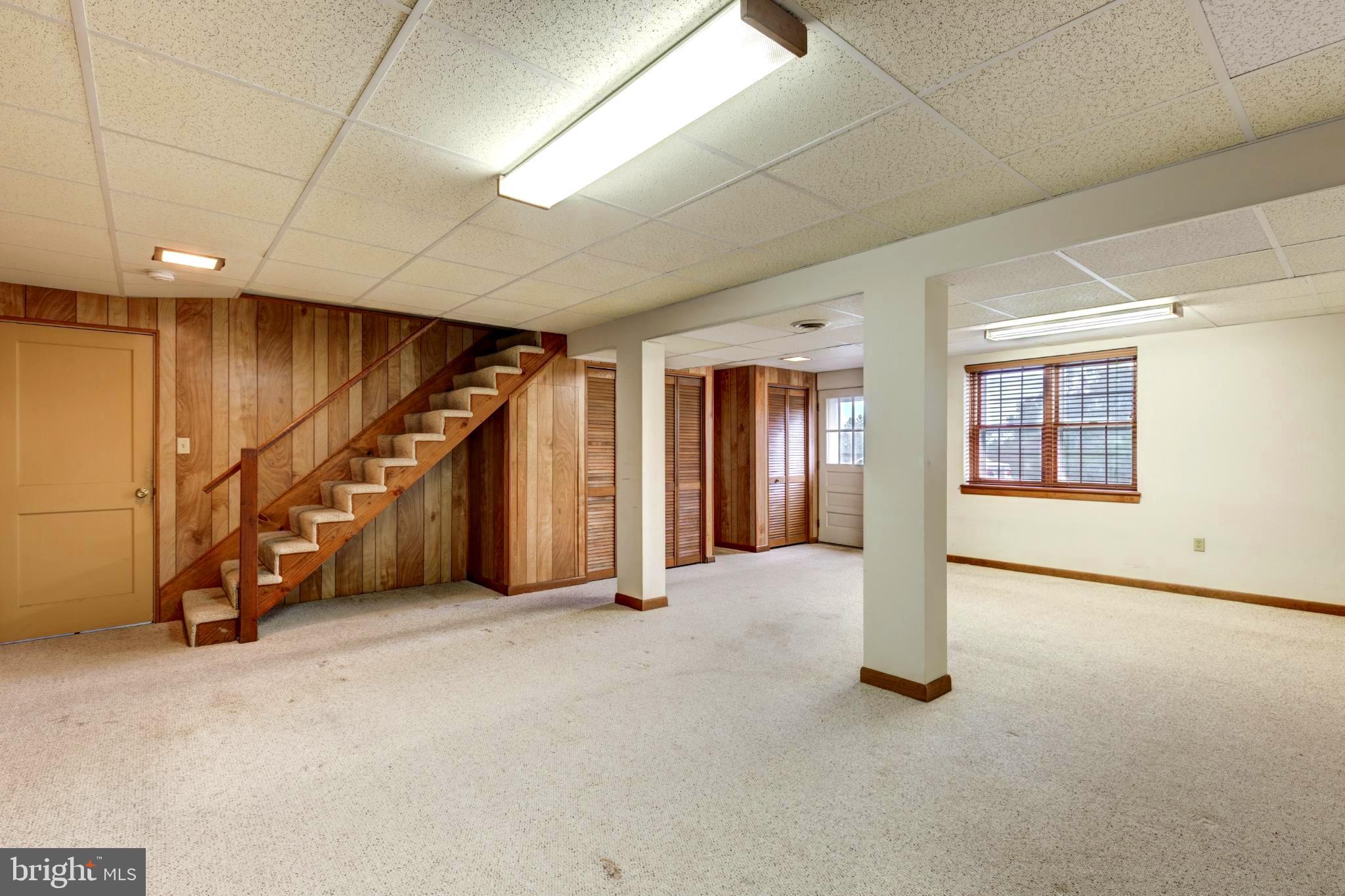 61 Ridge Road Westminster, MD 21157 - Photo 38 of 45 a view of an empty room with stairs
