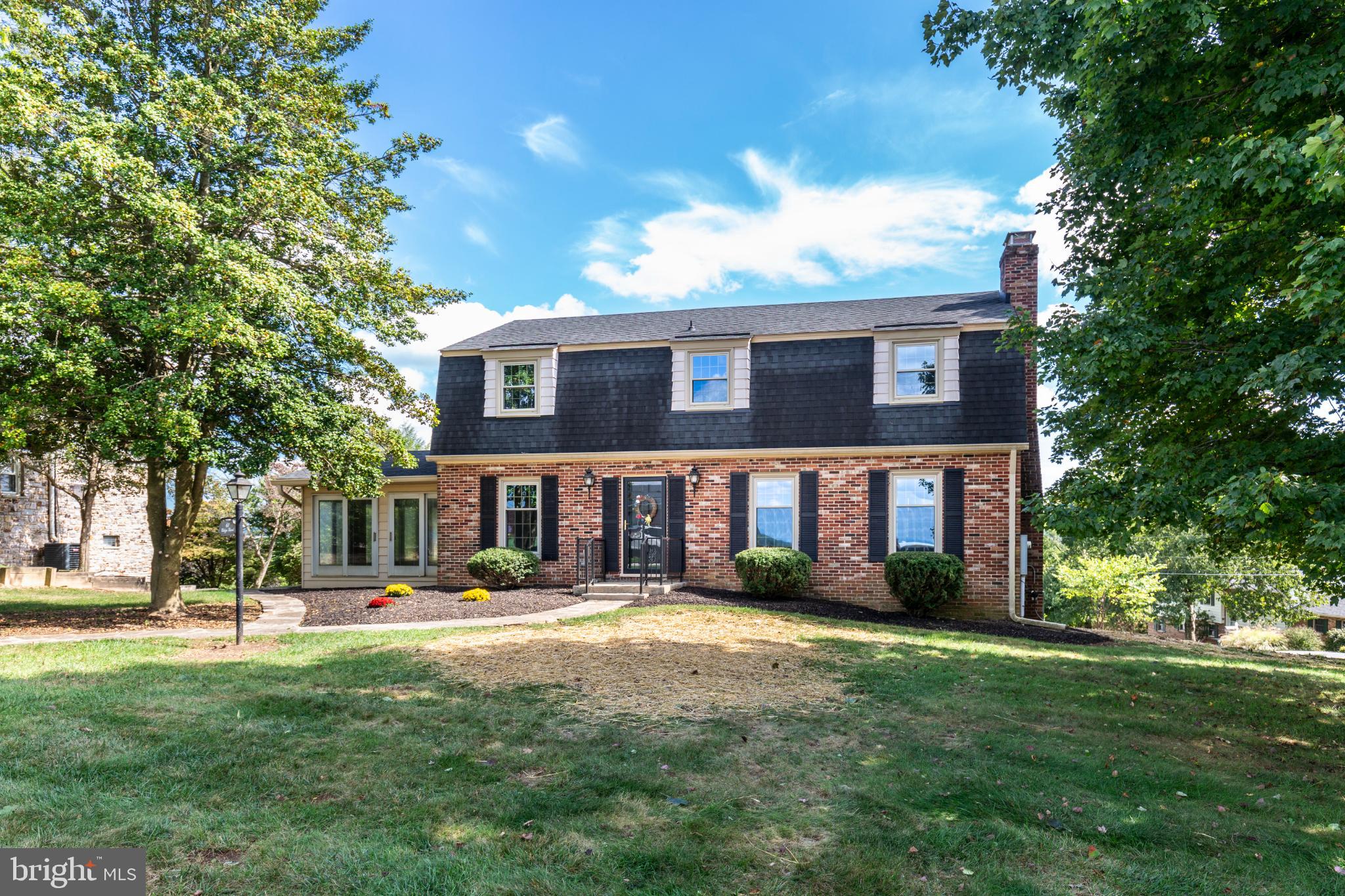 61 Ridge Road Westminster, MD 21157 - Photo 4 of 45 a front view of a house with a yard
