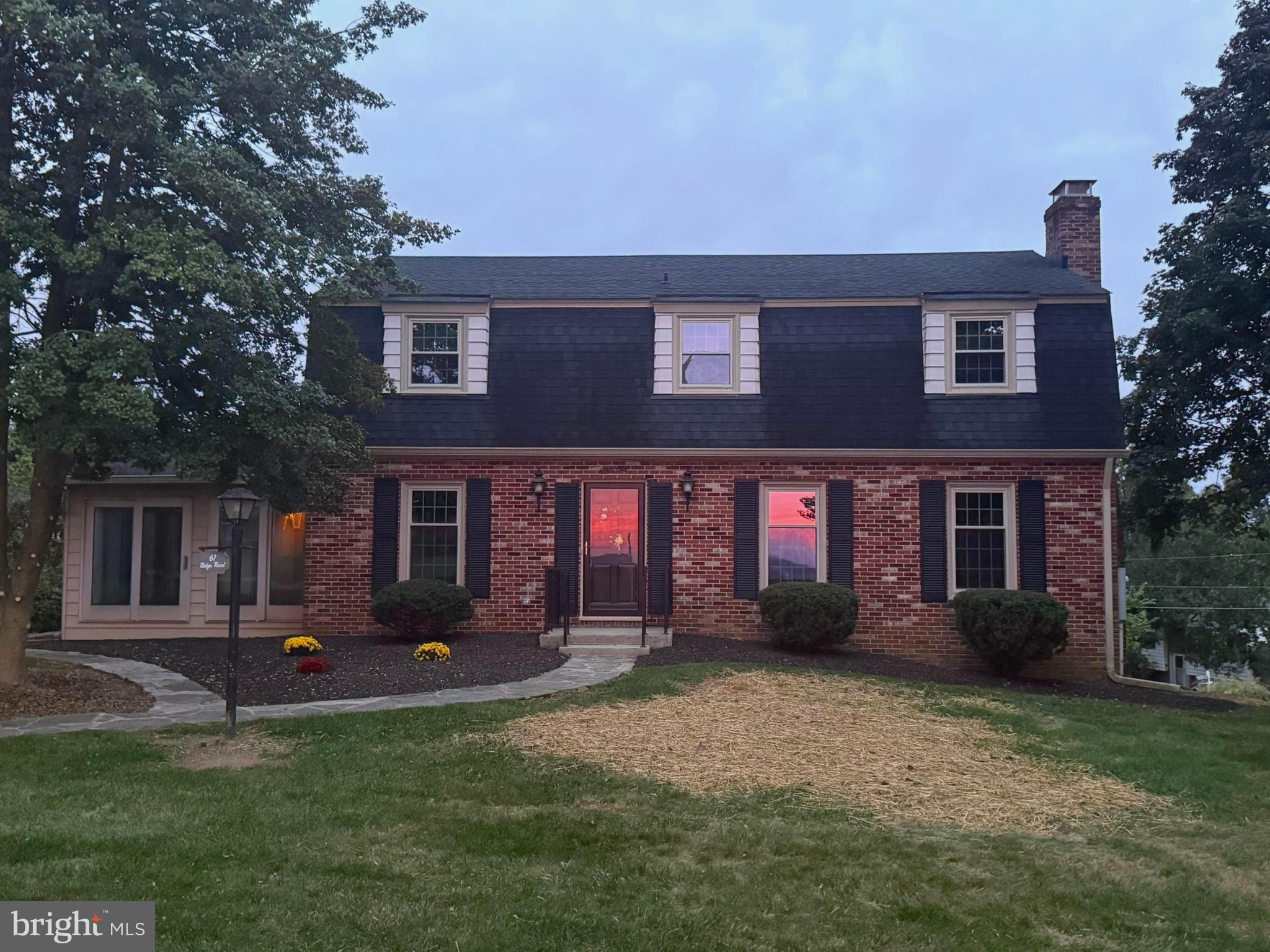 61 Ridge Road Westminster, MD 21157 - Photo 45 of 45 a front view of house with yard and green space