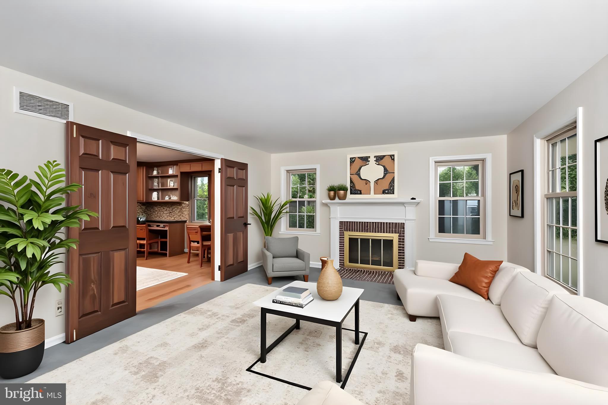 61 Ridge Road Westminster, MD 21157 - Photo 7 of 45 a living room with furniture fireplace and potted plant