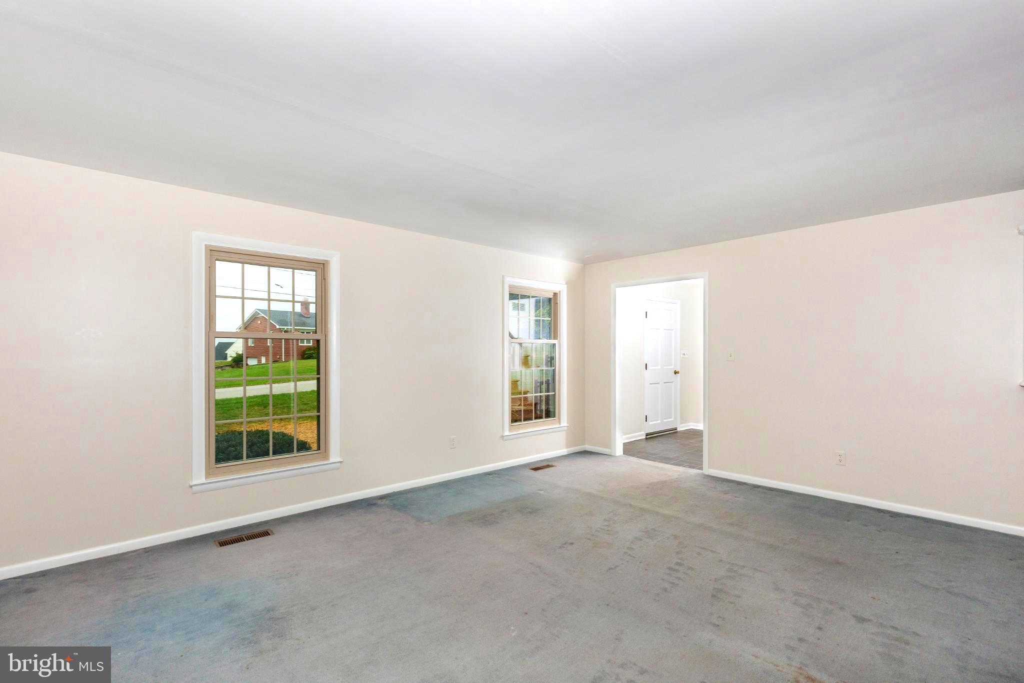 61 Ridge Road Westminster, MD 21157 - Photo 8 of 45 a view of an empty room with a window