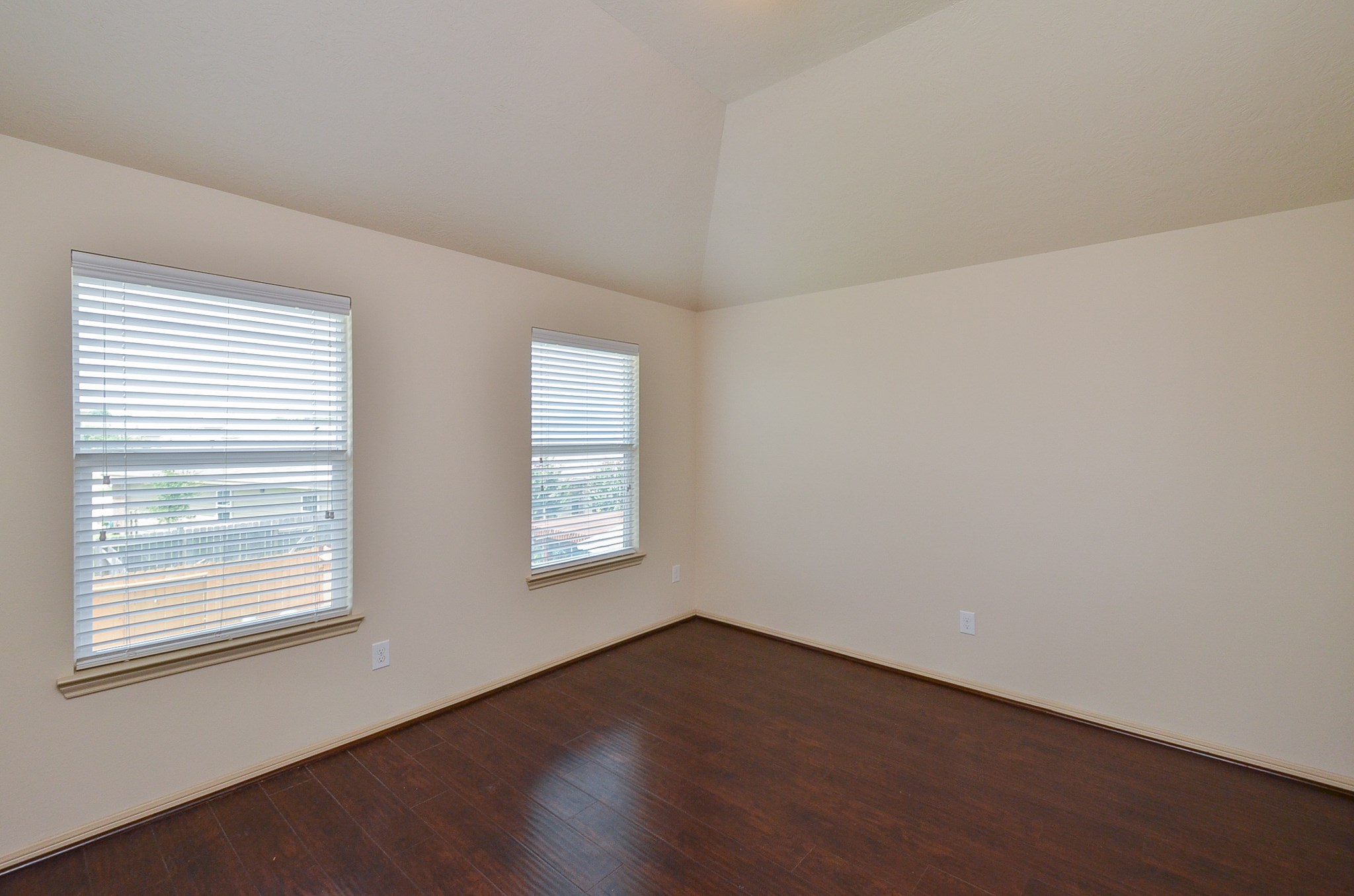 25135 Ginger Ranch Drive Katy, TX 77494 - Photo 17 of 32 Game Room View 2: Bright and airy with wood-style flooring and window views that bring in natural light.