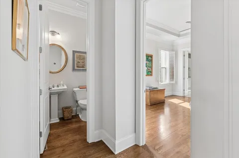 a view of a bedroom from a hallway