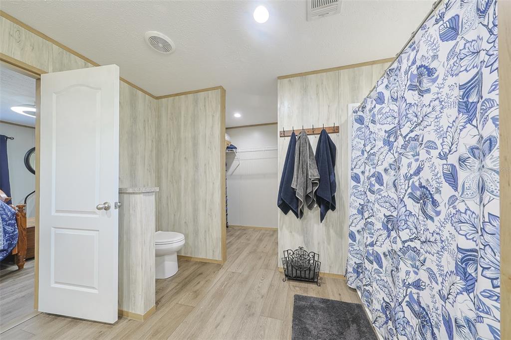 12124 Redrose Avenue Weeki Wachee, FL 34614 - Photo 21 of 57 a bathroom with a shower and a sink