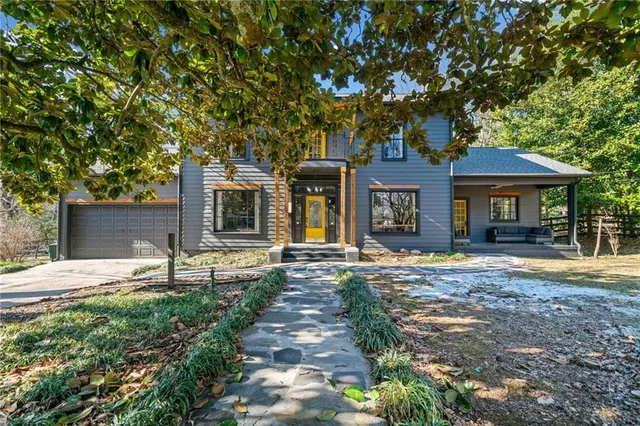 front view of a house with a small yard