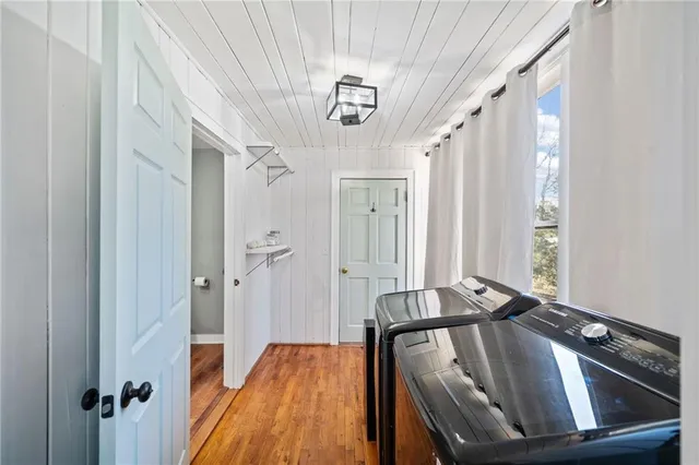 a view of bathroom with bathtub and shower