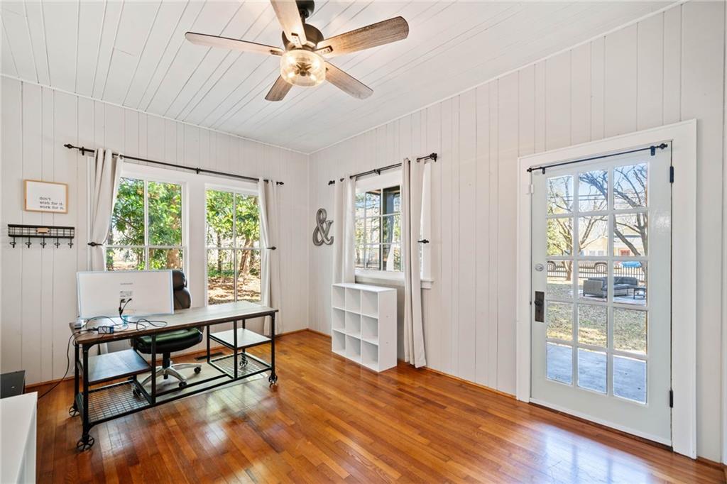 634 South Main Street Jasper, GA 30143 - Photo 29 of 39 a workspace with wooden floor and a window