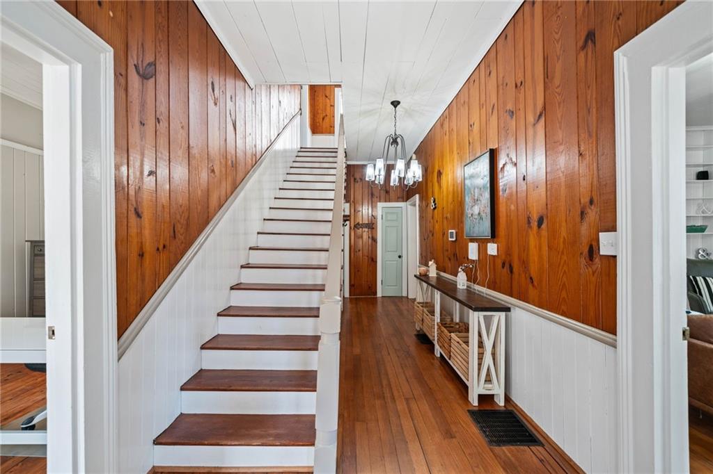 634 South Main Street Jasper, GA 30143 - Photo 30 of 39 a view of a hallway with wooden floor and stairs