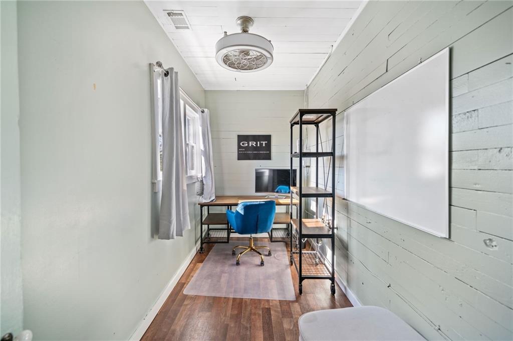 634 South Main Street Jasper, GA 30143 - Photo 7 of 39 a workspace with furniture window and wooden floor