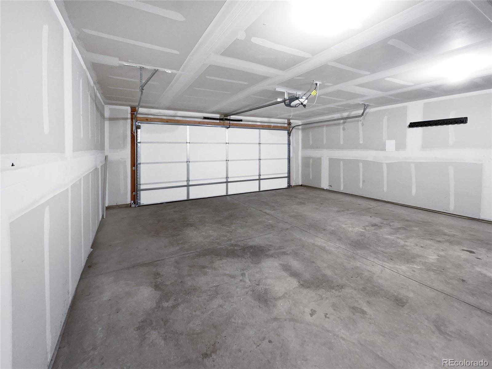 322 Bozeman Trail Ault, CO 80610 - Photo 13 of 19 a view of a garage