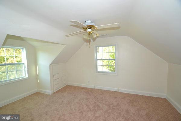 4405 Wakefield Road Baltimore, MD 21216 - Photo 8 of 17 an empty room with windows and fan