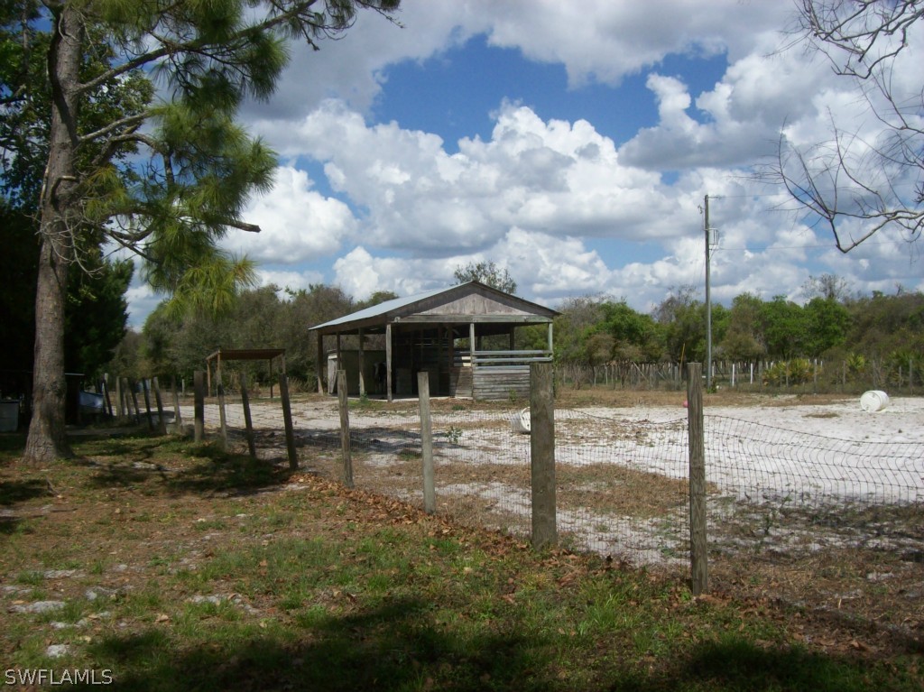 21901 Claytor Road Alva, FL 33920 - Photo 8 of 17 a view of a house with a yard