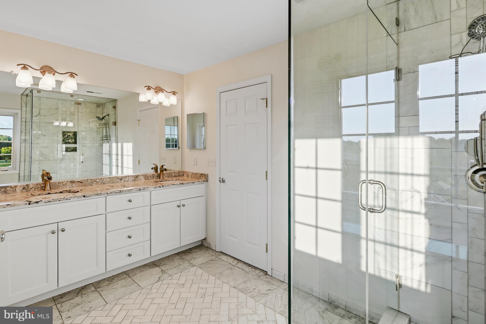 152 Springfield Circle Middletown, DE 19709 - Photo 11 of 29 a spacious bathroom with a double vanity sink mirror and double