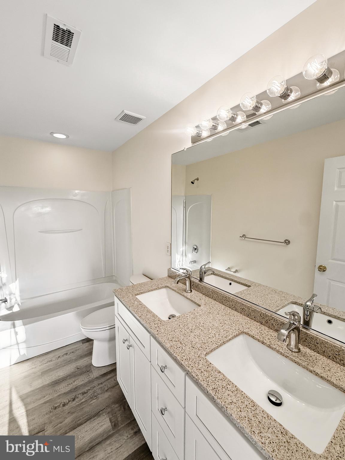 152 Springfield Circle Middletown, DE 19709 - Photo 17 of 29 a bathroom with a granite countertop double vanity sink and a mirror