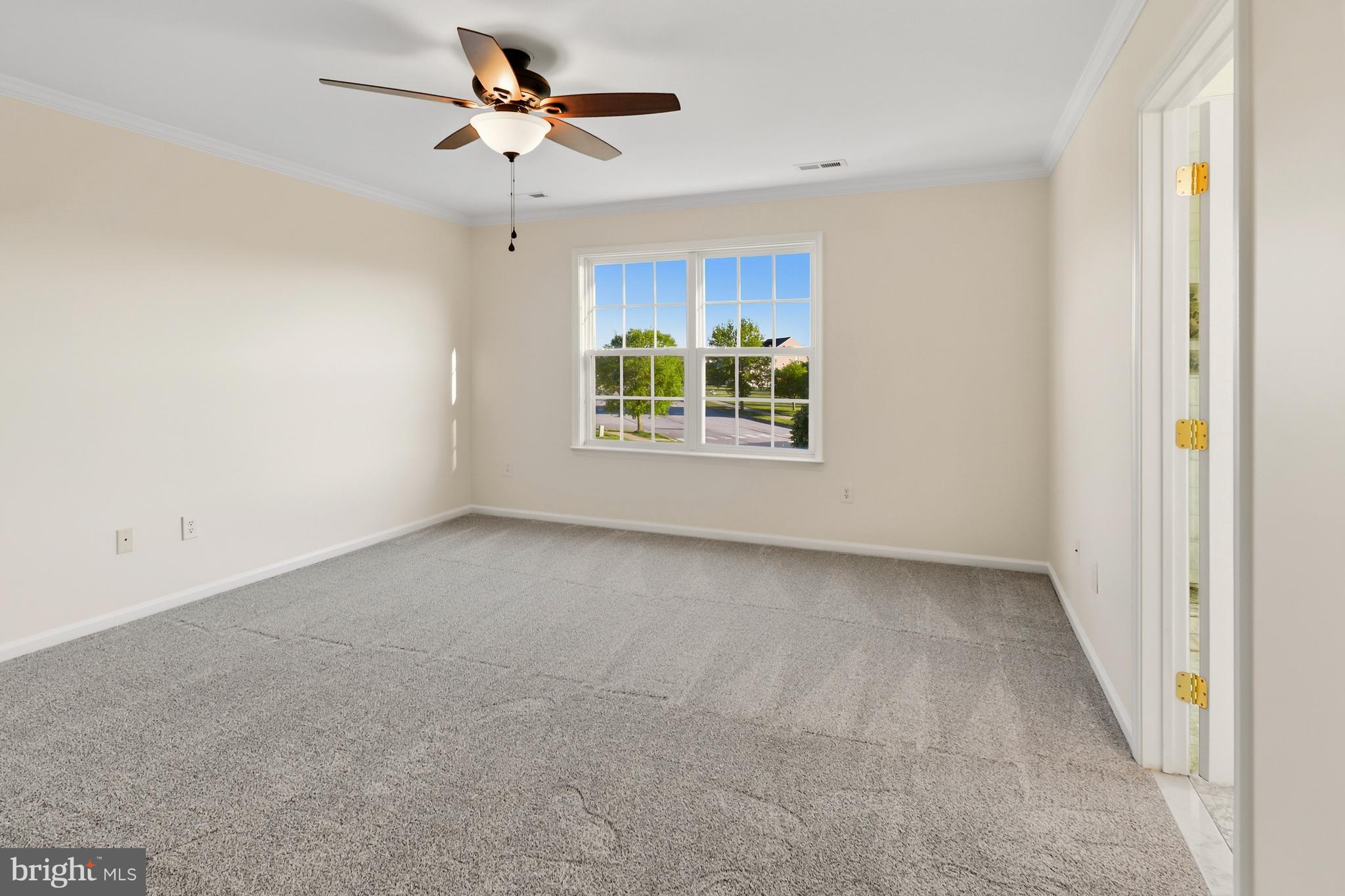 152 Springfield Circle Middletown, DE 19709 - Photo 20 of 29 wooden floor in an empty room with a window