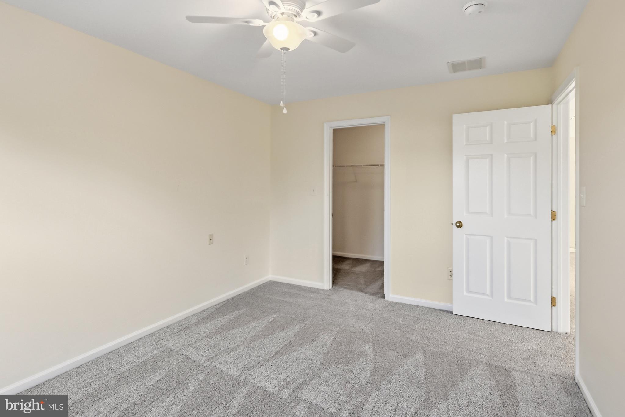 152 Springfield Circle Middletown, DE 19709 - Photo 23 of 29 a view of an empty room with a chandelier fan