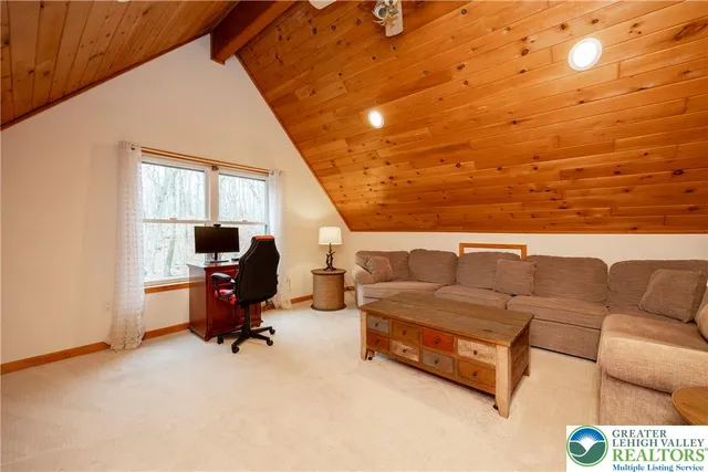 a kitchen with stainless steel appliances granite countertop a stove and a wooden floors