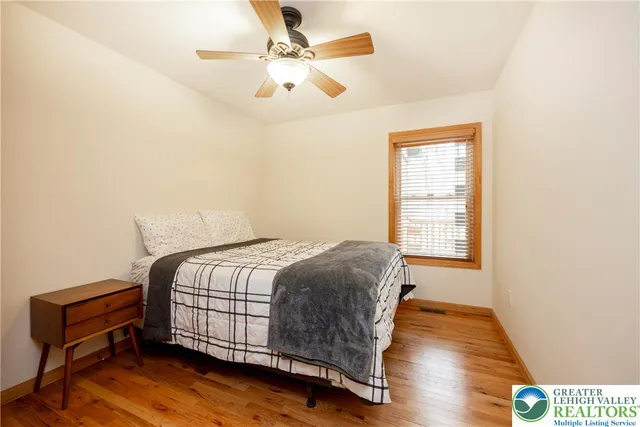 a view of balcony with wooden floor