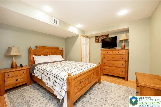 a view of a house with a yard and garage