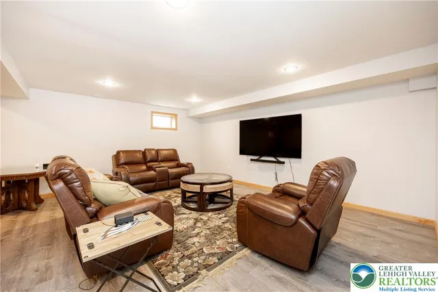 a view of a house with a yard and garage