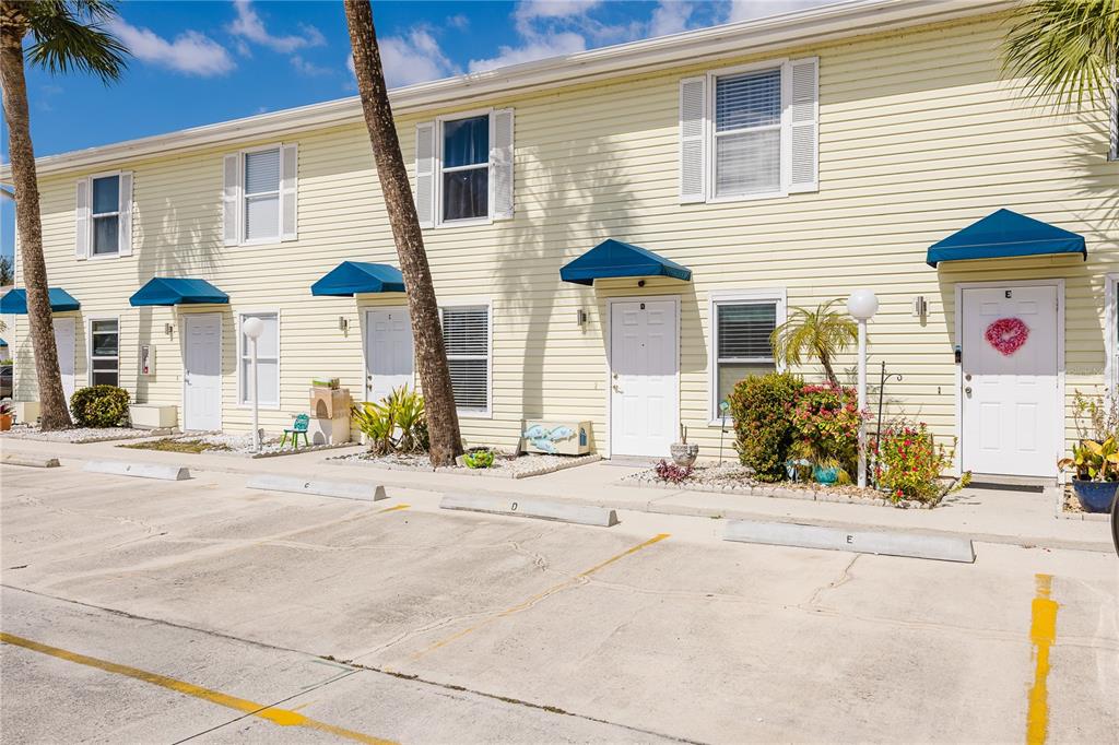 26282 Rampart Boulevard, Unit 204 Punta Gorda, FL 33983 - Photo 3 of 34 a view of outdoor space and front view of a house