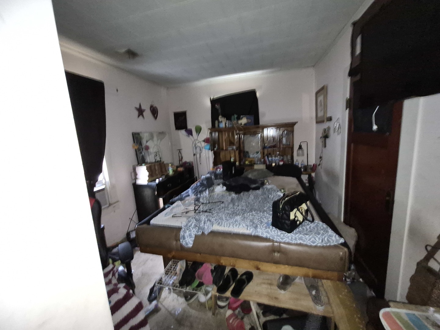 517 South 6th Street Herrin, IL 62948 - Photo 5 of 6 a living room with furniture and a flat screen tv